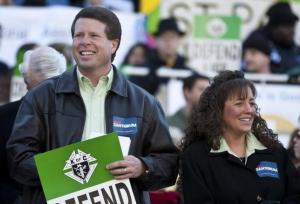 Jim Bob Duggar (L) and his wife Michelle Duggar (R), supporters of Republican presidential candidate and former Pennsylvania Senator Rick Santorum, attend a Pro-Life rally  in Columbia, South Carolina, on the steps of the State House January 14, 2012. REUTERS/Chris Keane