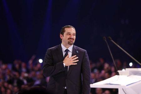 Lebanon's former prime minister al-Hariri gestures during the 10th anniversary of his father's assassination, in Beirut