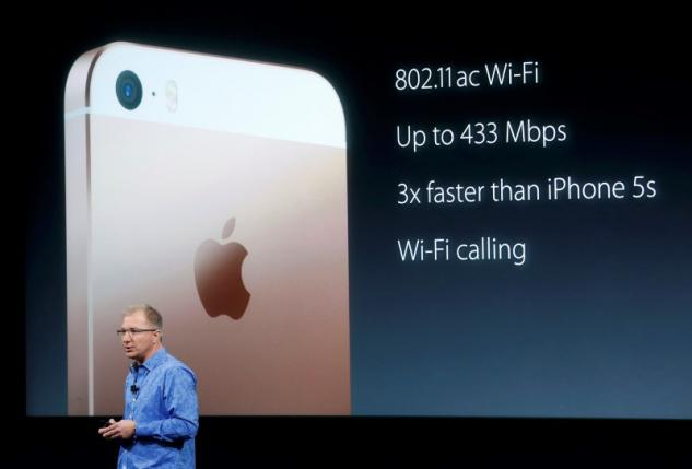 Apple Vice President Greg Joswiak introduces the iPhone SE during an event at the Apple headquarters in Cupertino, California
